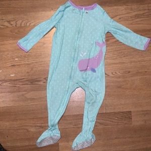 A whale pajama onesie